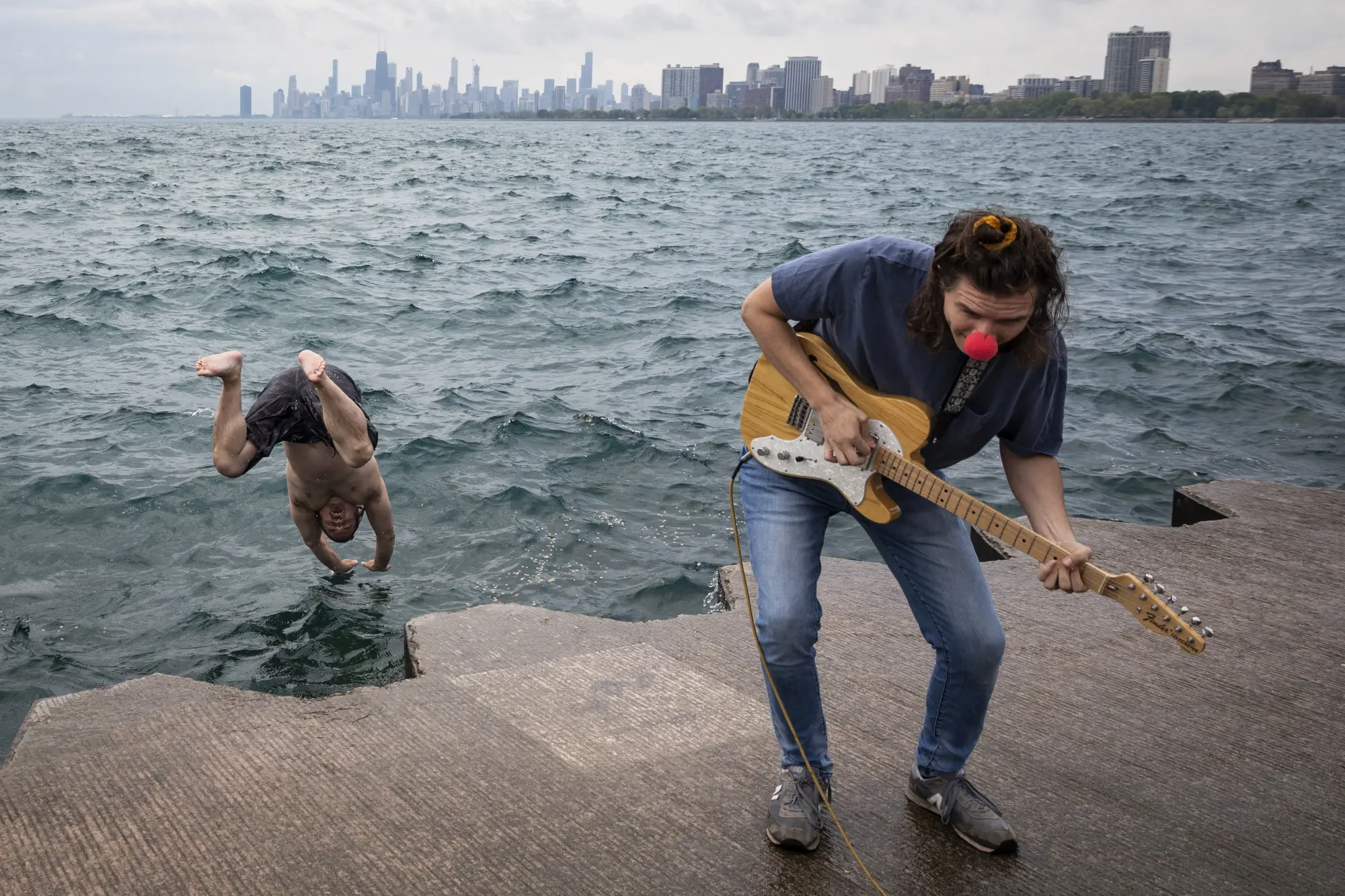 man jumps into lake michigan